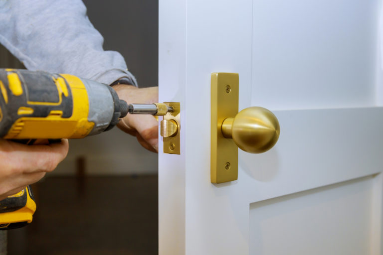 man drilling locks commercial locksmith services in largo, fl – rapid and reliable locksmith services for your office and business